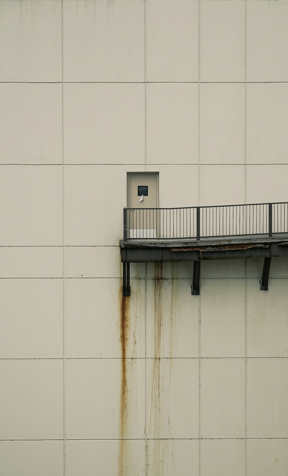 white concrete wall during daytime