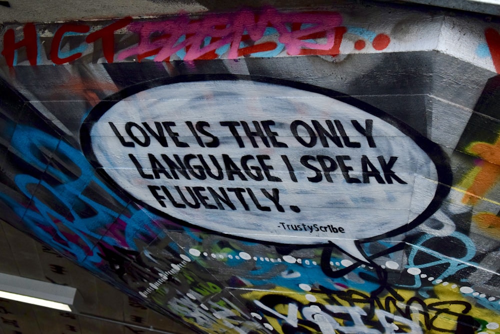 love is the only language i speak fluently wall art