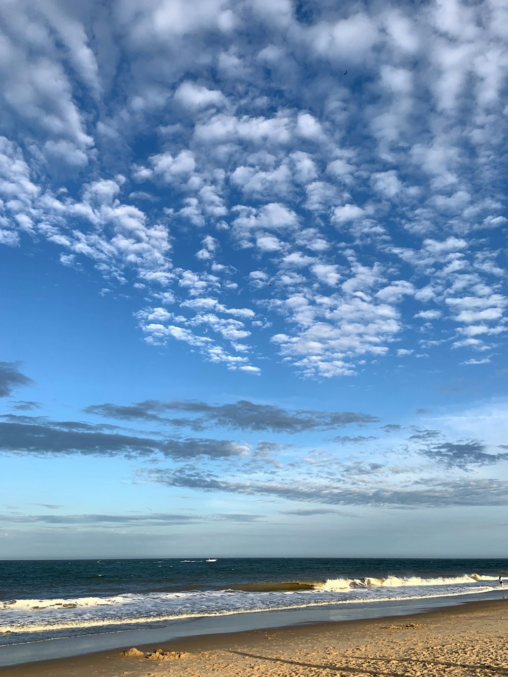 white clouds and seashore