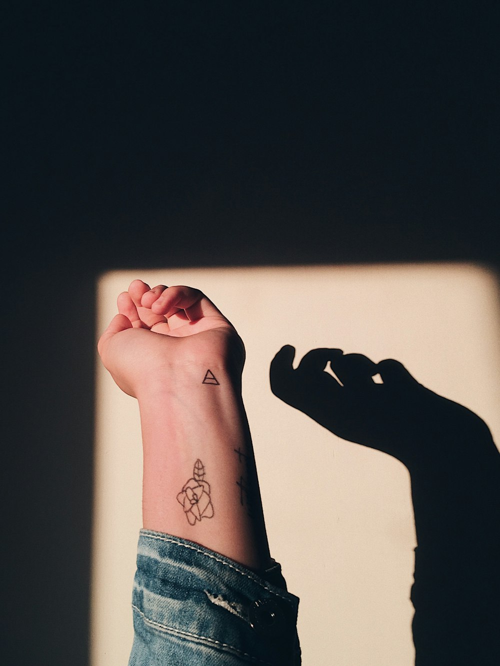 woman having rose tattoo