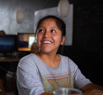 smiling girl looking at her right