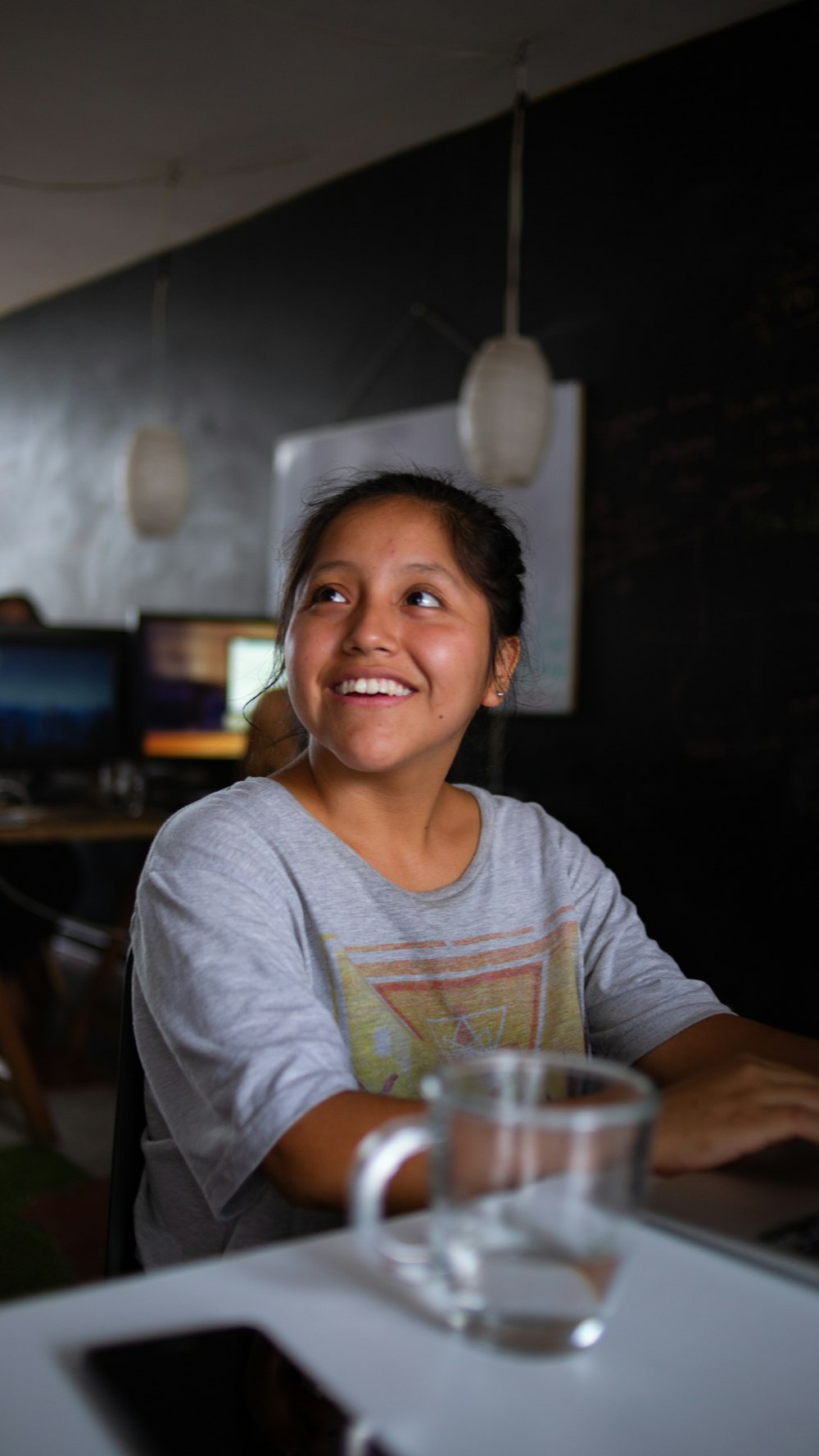 smiling girl looking at her right