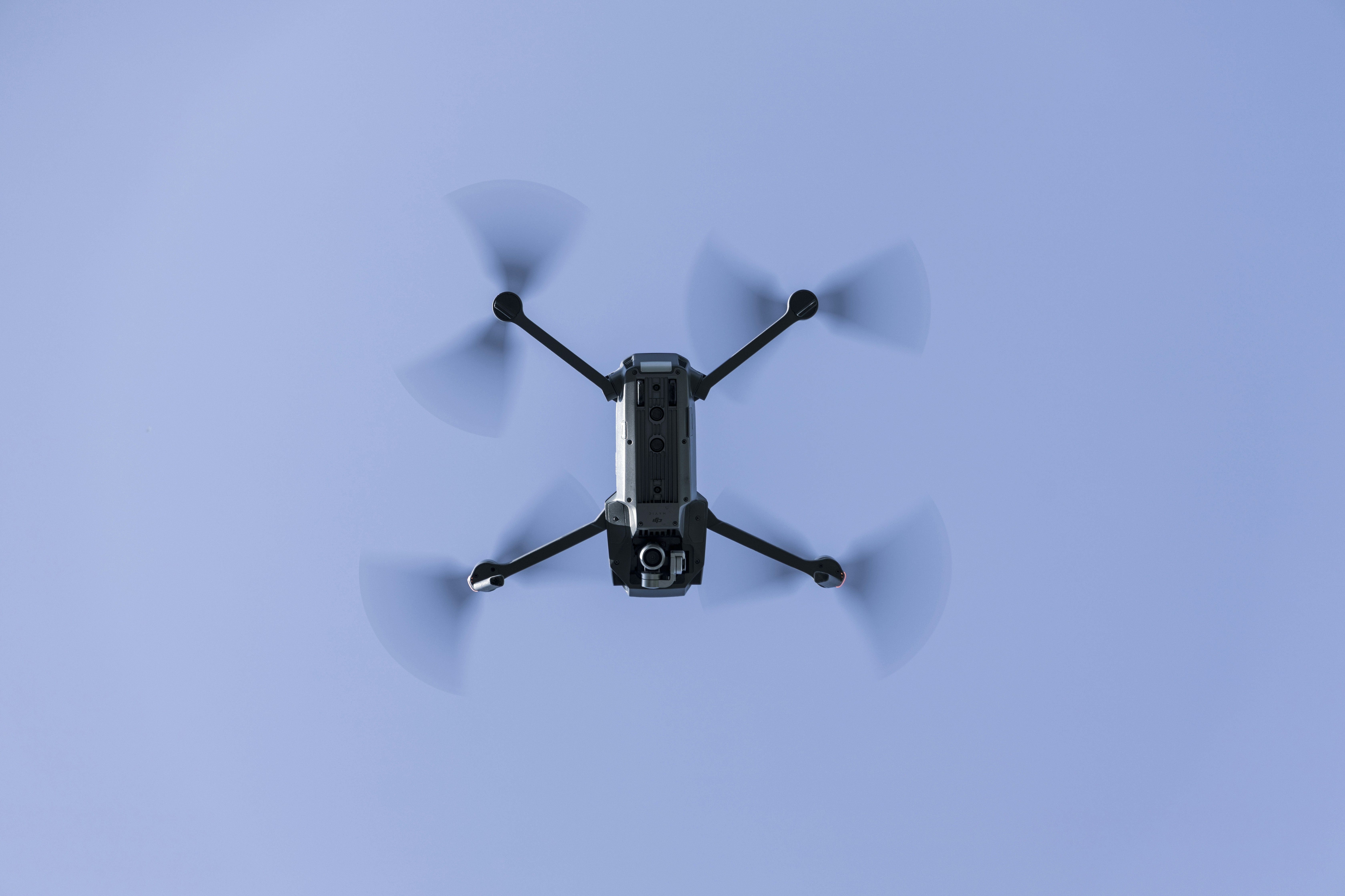 black quadcopter drone
