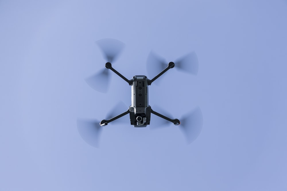 black quadcopter drone