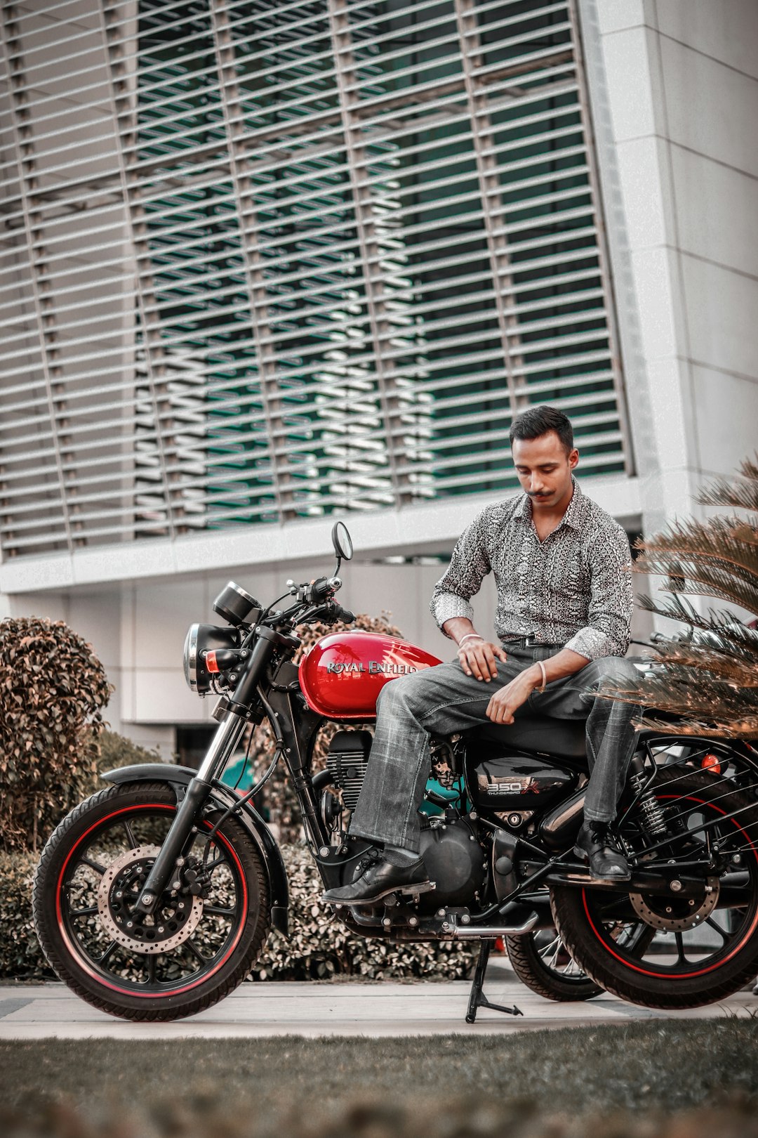 man sitting on motorcycle