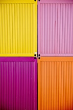 pink, yellow, purple, and orange wooden boards
