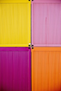 pink, yellow, purple, and orange wooden boards
