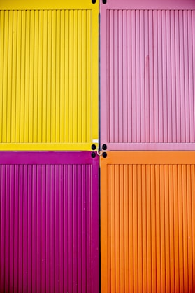 pink, yellow, purple, and orange wooden boards