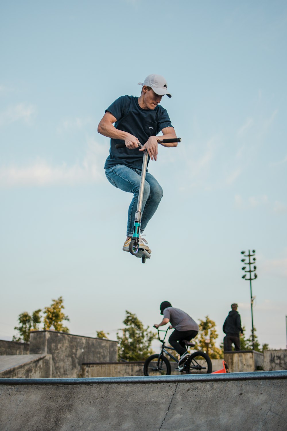man playing kick scooter