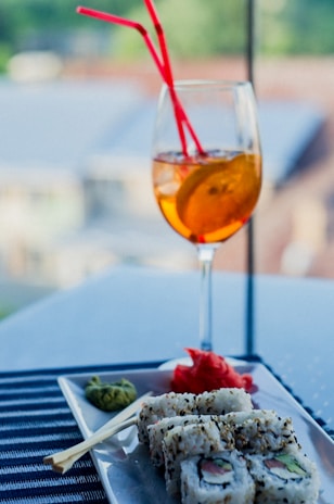 selective focus photography of wine glass