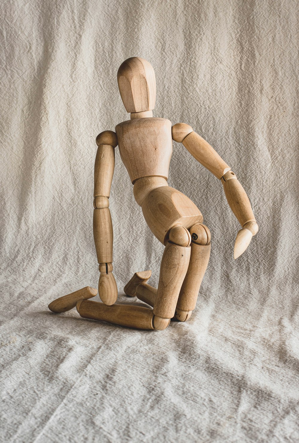 brown wooden human figure