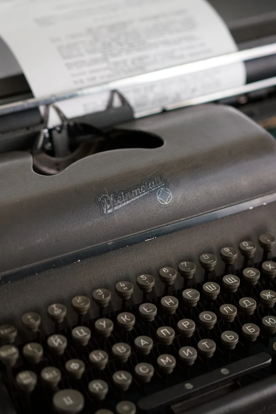 Vintage black typewriter on a wooden surface