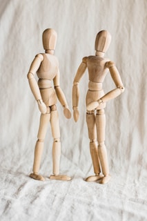 two human figure wooden action figures