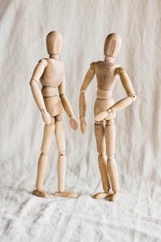two human figure wooden action figures