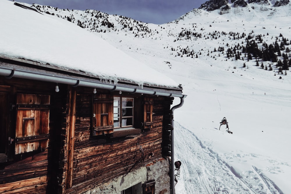 brown house on snowfield