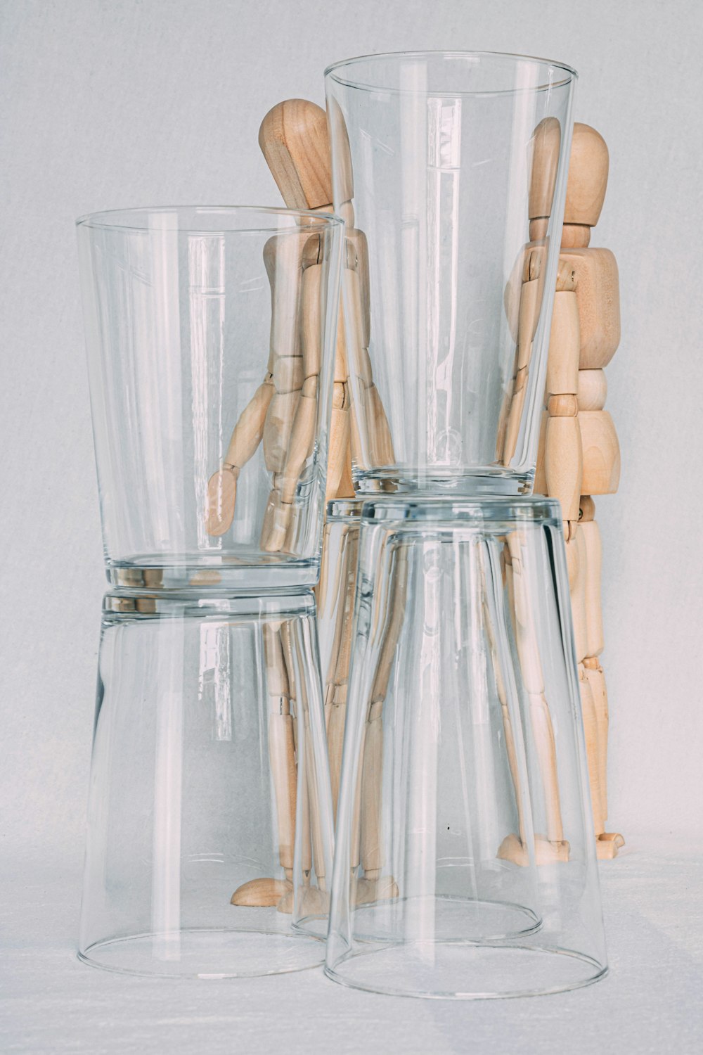 five clear drinking glasses