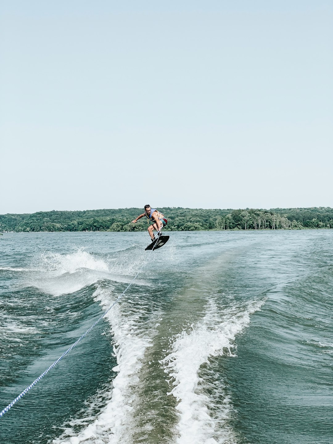 man riding on wake board