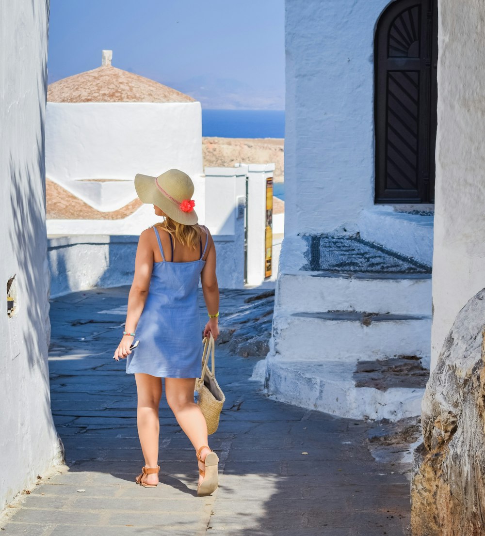 woman wearing blue dress