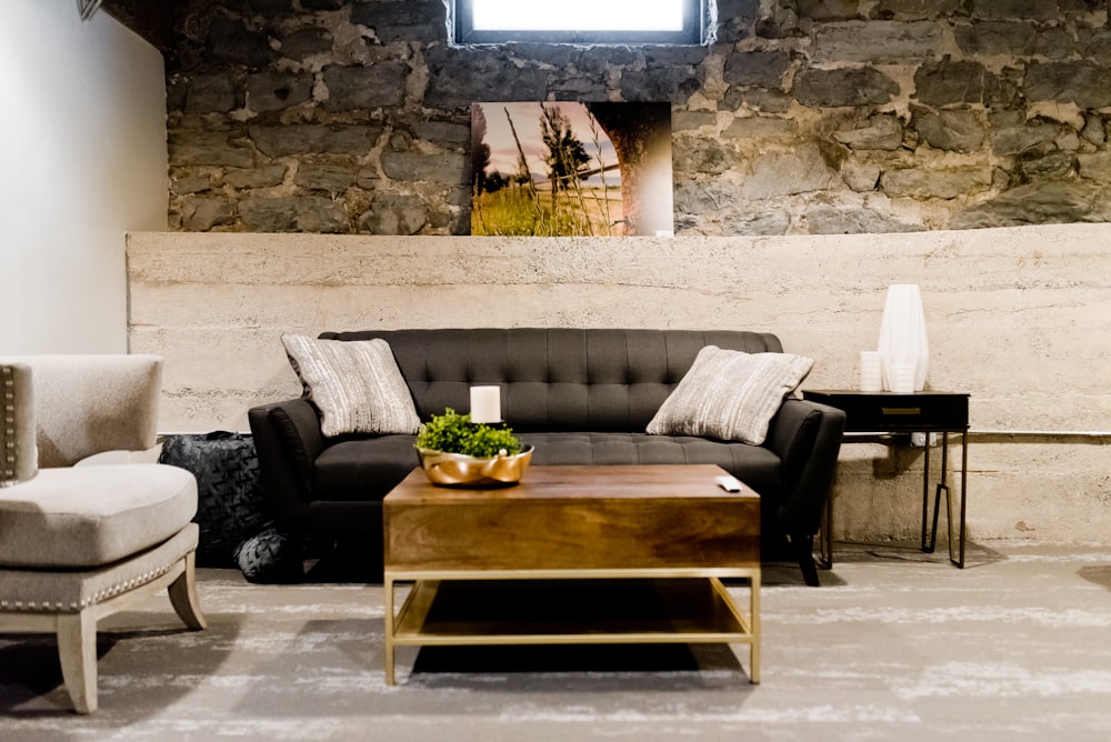 gray couch and brown wooden table