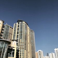 Corporate buildings in São Paulo with modern architectural design under clear sky.