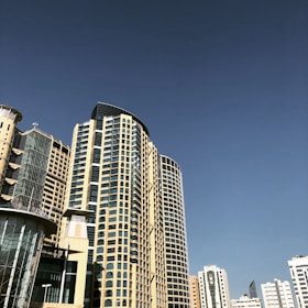 Corporate buildings in São Paulo with modern architectural design under clear sky.