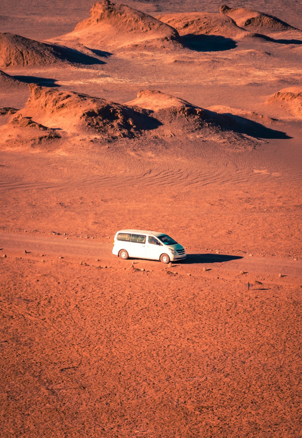white van on desert photo