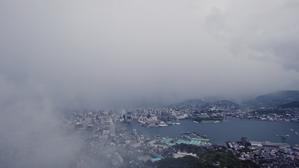 a large body of water surrounded by a city