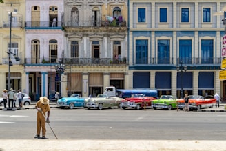 five assorted-colored cars photo