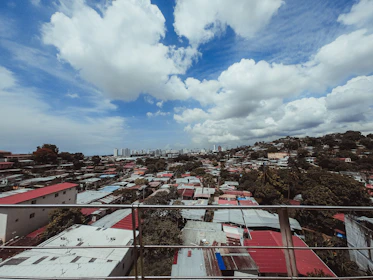 A panoramic view of multiple residential roofs completed by Safeway Roofing in Kings Park neighborhood.