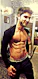 Happy man showing his slimmer waistline after using the product