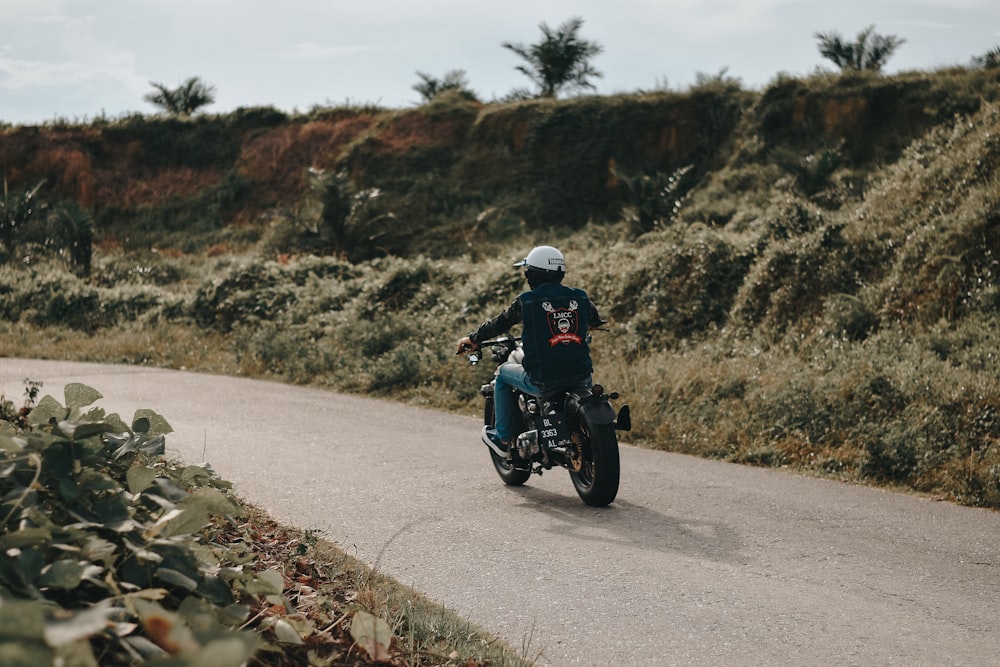 man riding motorcycle