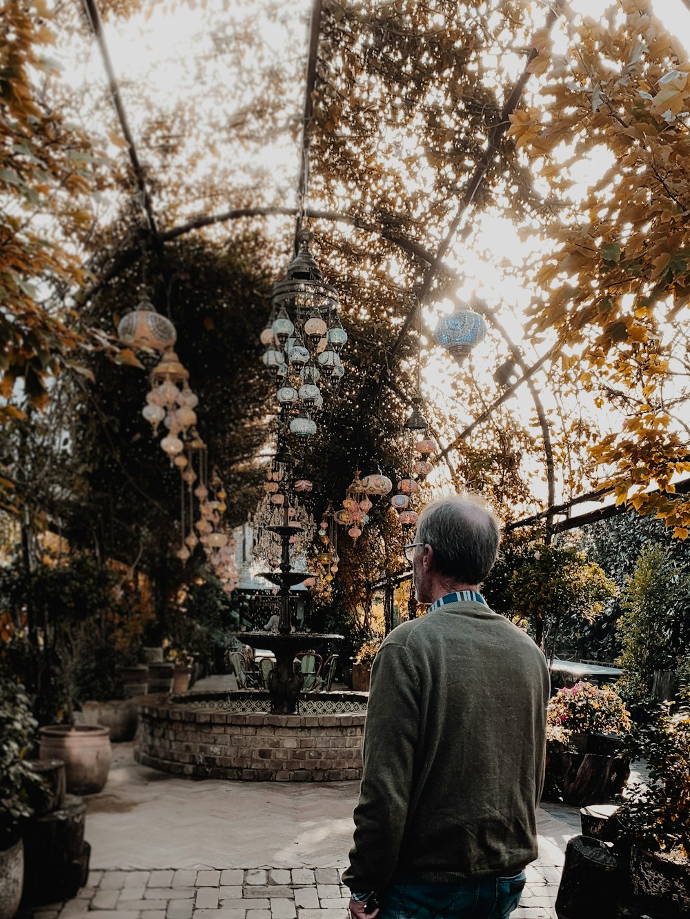 man wearing green sweatshirt