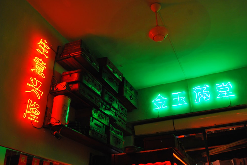 amplifiers on wall rack inside building with LED signage