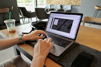 person using laptop computer