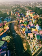 high angle photography of rainbow painted roofed houses