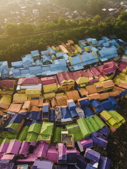 A colorful map highlighting various villages with population markers.