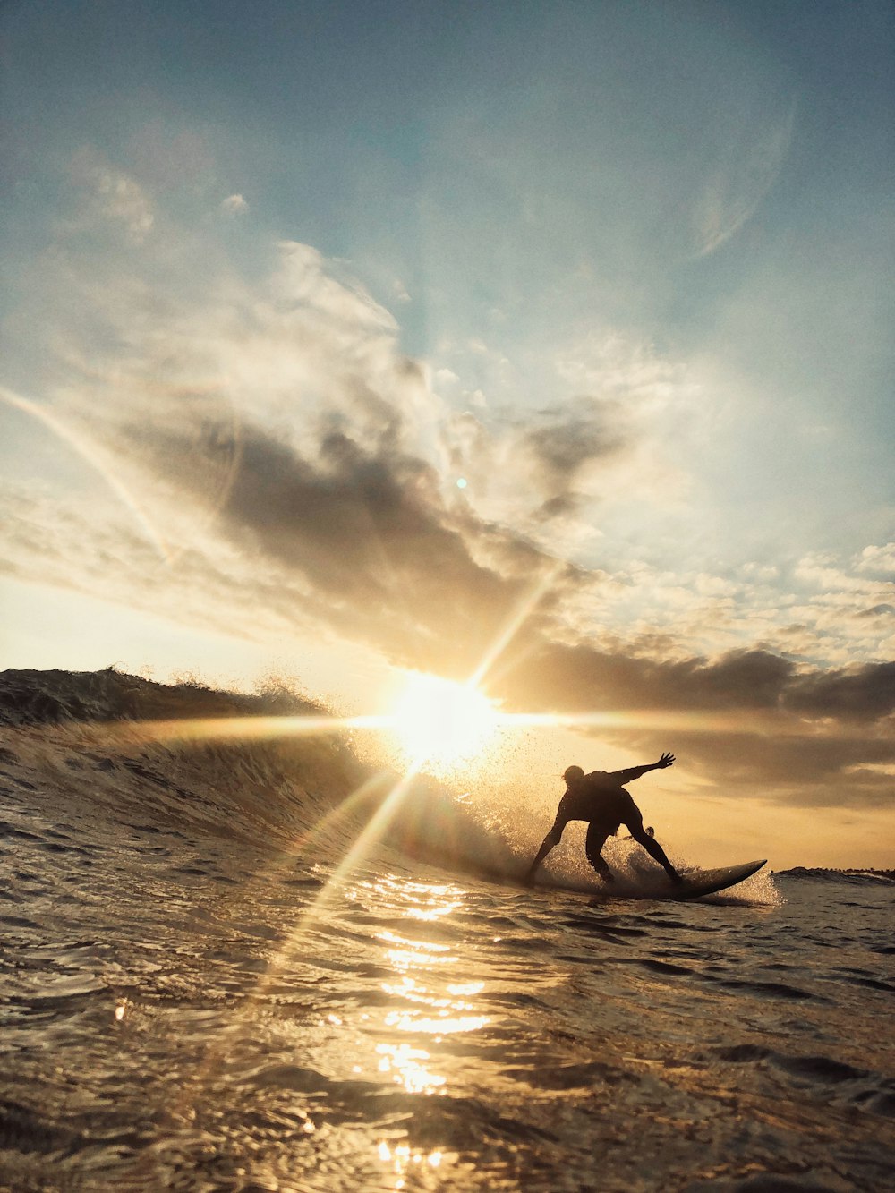 person riding surfboard