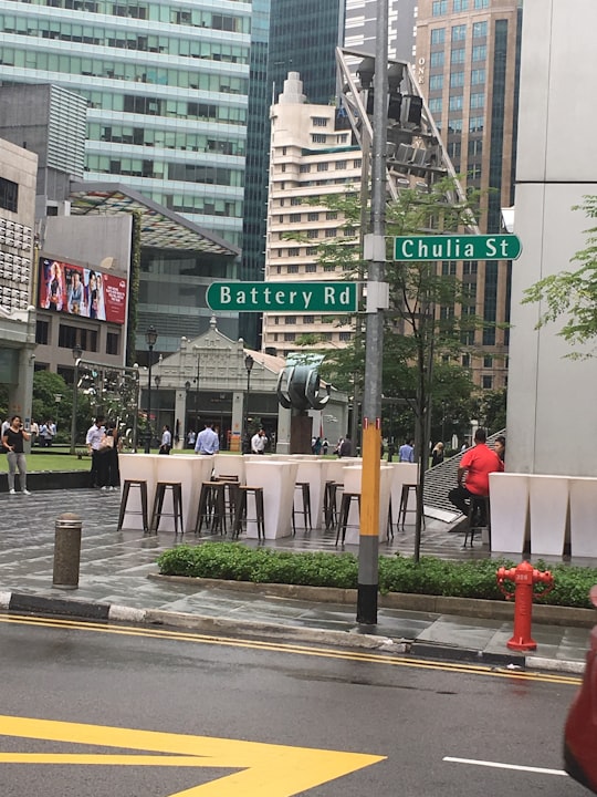 Battery road and Chulia street signage at the road in 50 Raffles Place Singapore