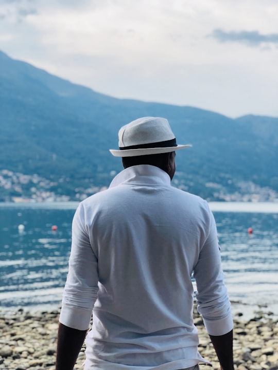 man wearing white jacket during daytime in Via San Gregorio Italy