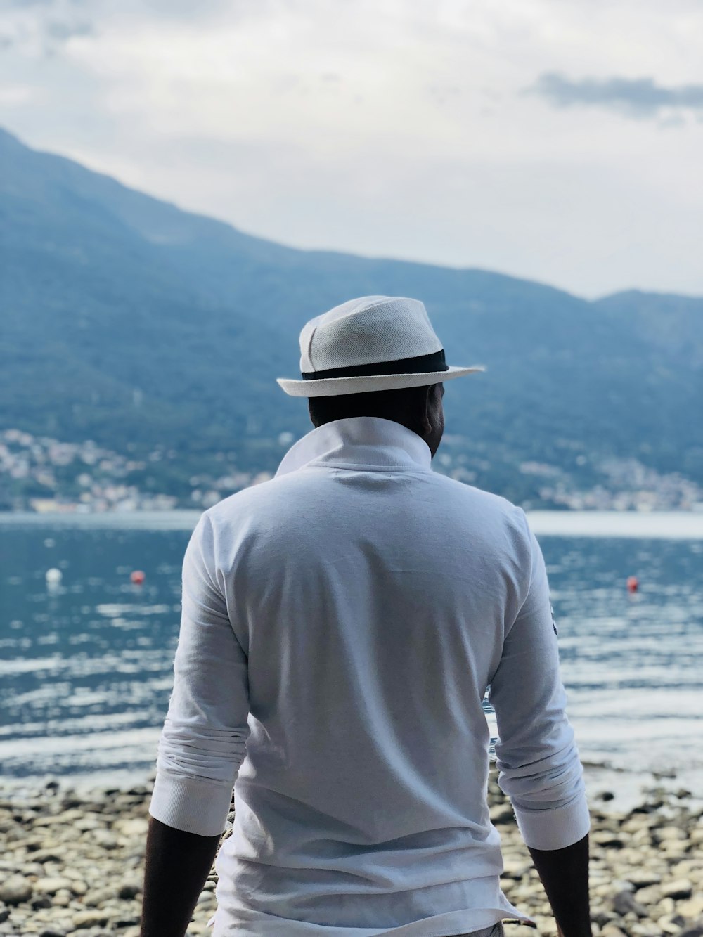 man wearing white jacket during daytime