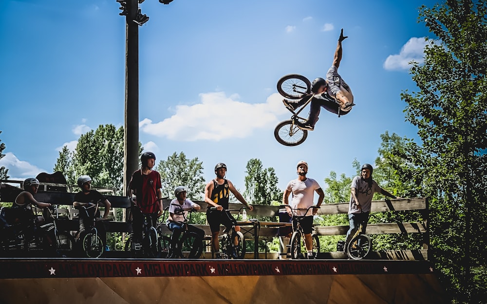 person doing bike exhibition during daytime