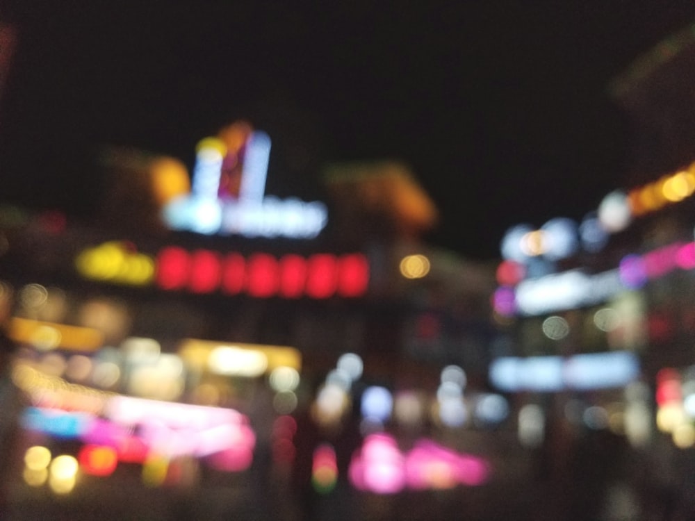 a blurry photo of a city at night