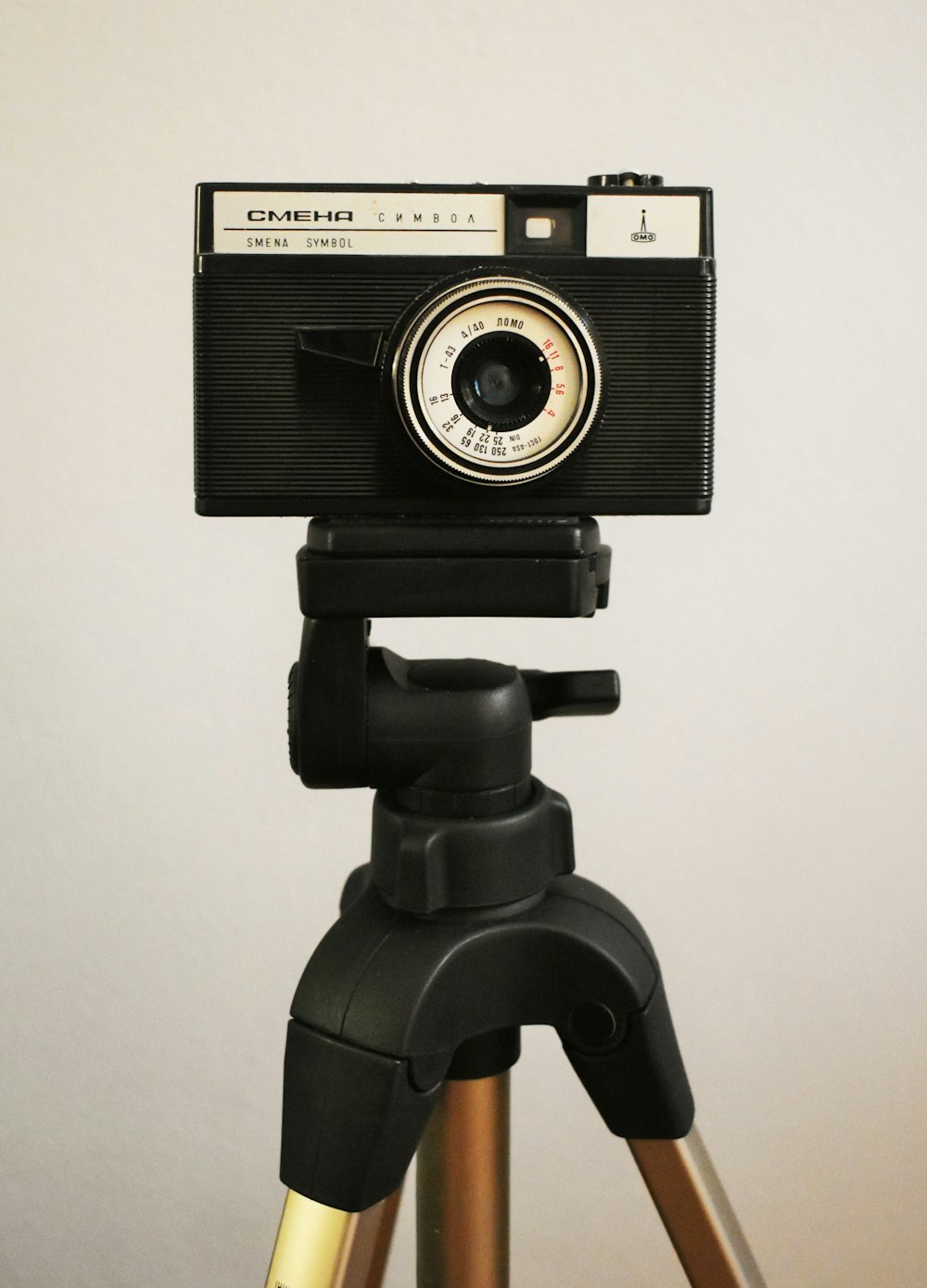 black camera on tripod