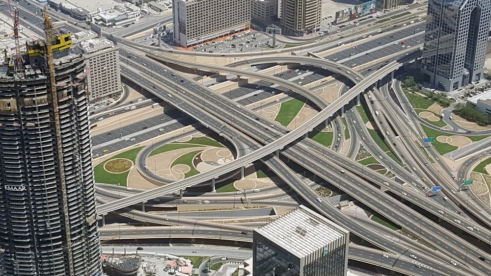 gray concrete road near high-rise buildings