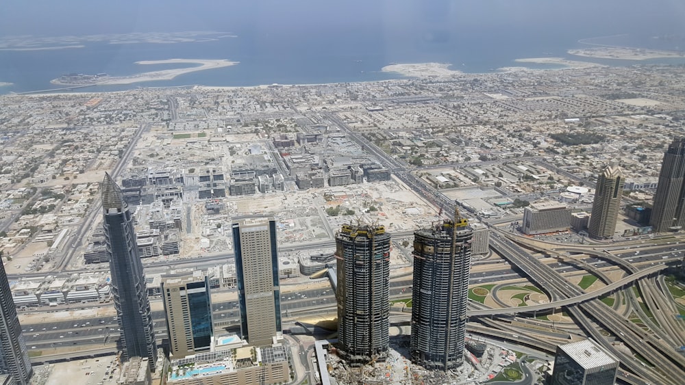 aerial photo of high rise building near sea during daytime