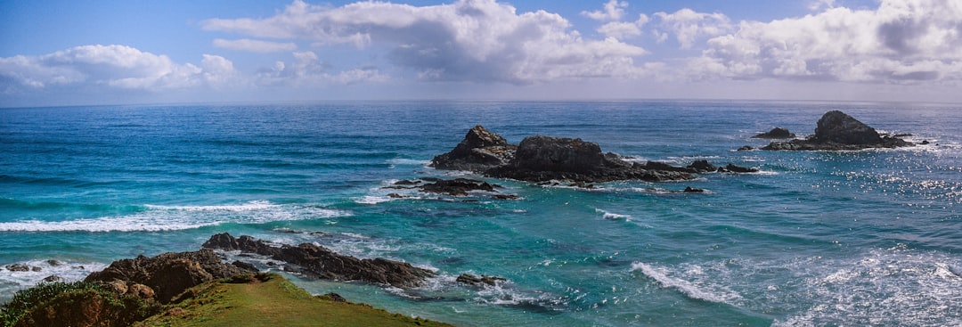 brown rock islets in beach