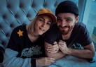smiling man and woman taking selfie