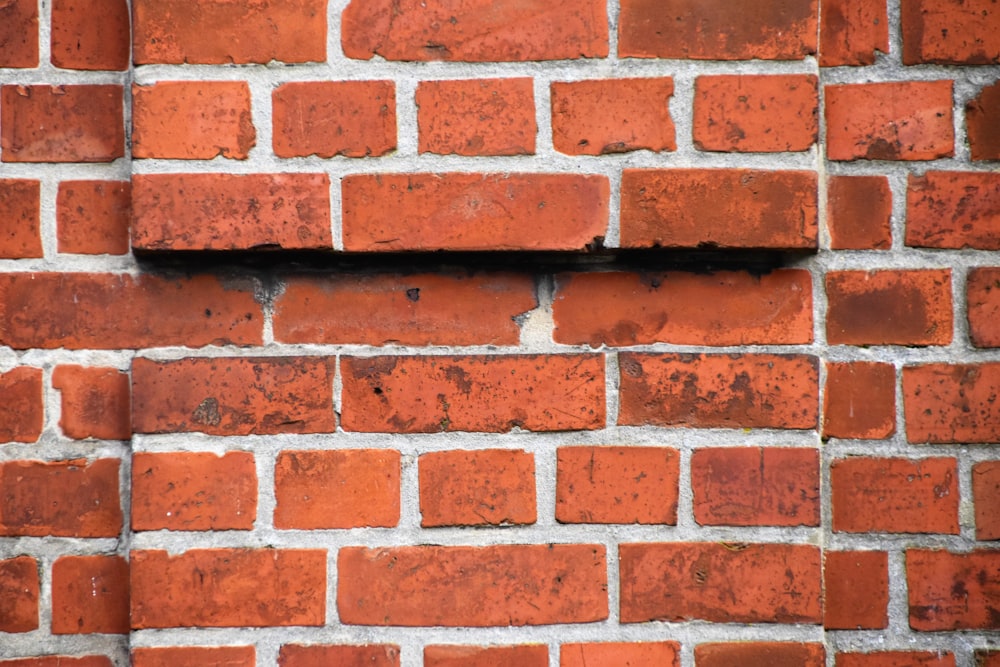 Nahaufnahme der roten Backsteinmauer