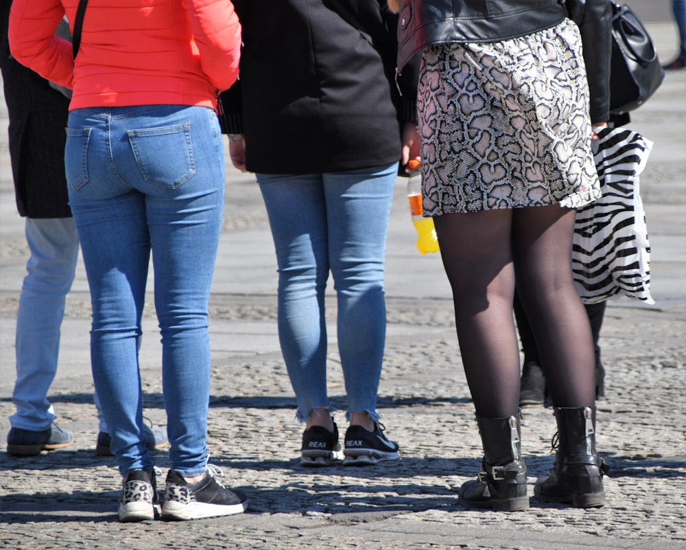 group of people standing on street