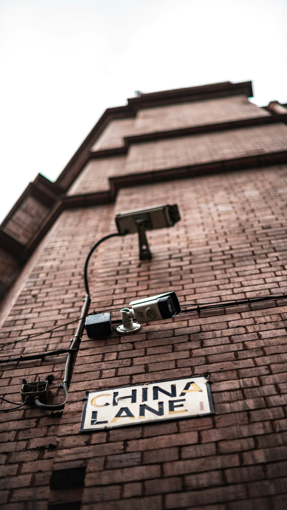 low angle photo of brown building in China Lane